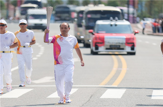 亚运火炬手韦晓青：参与“大莲花”建设，传递火炬一生难忘